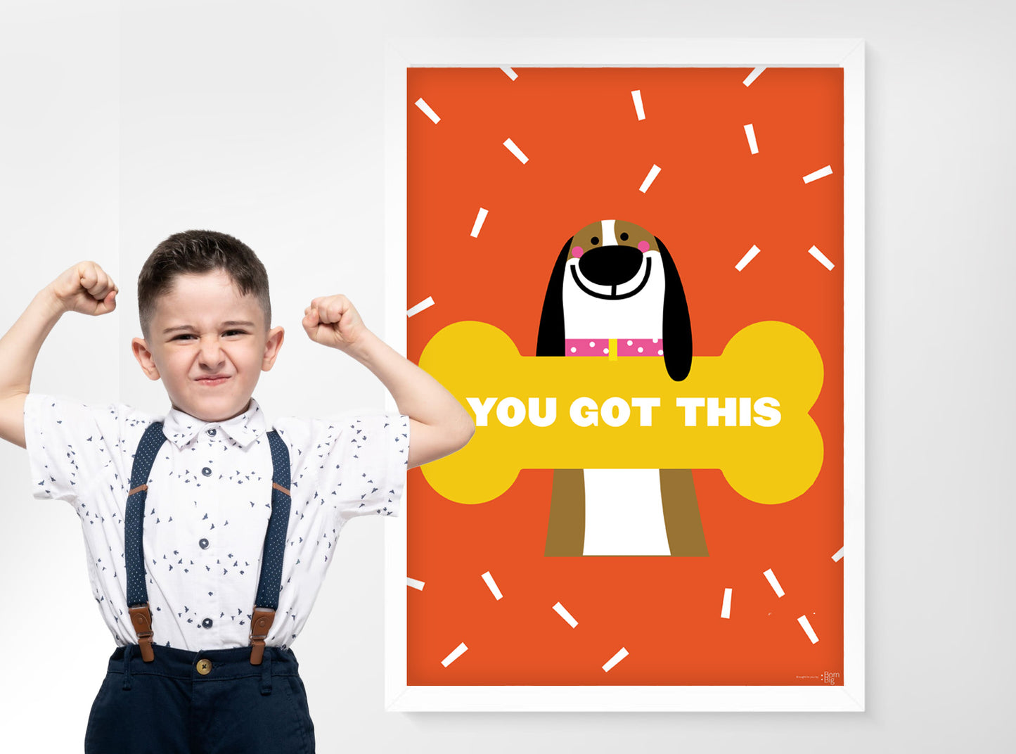 A1 poster of dog with oversized bone and text "You Got This". Cute photo of little boy pretending to flex is muscles to show he is strong